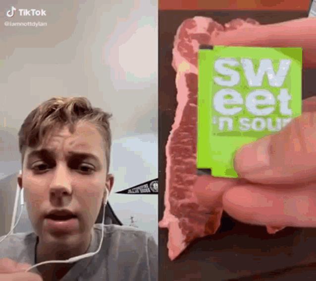 a man is holding a piece of meat next to a box of sweet n sour