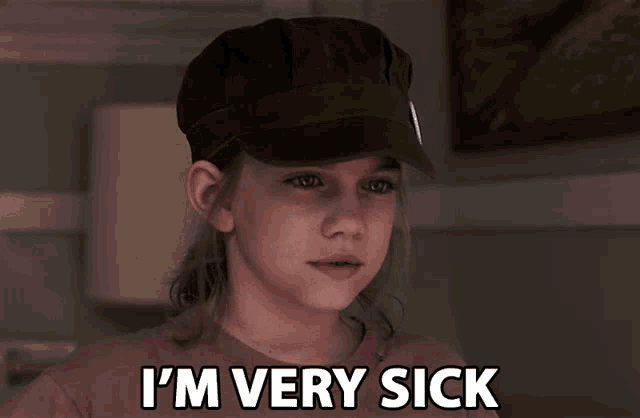 a girl wearing a baseball cap says i 'm very sick