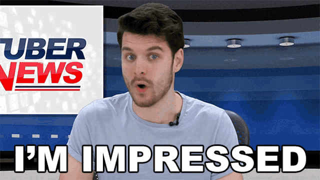 a man with a surprised look on his face in front of a uber news sign
