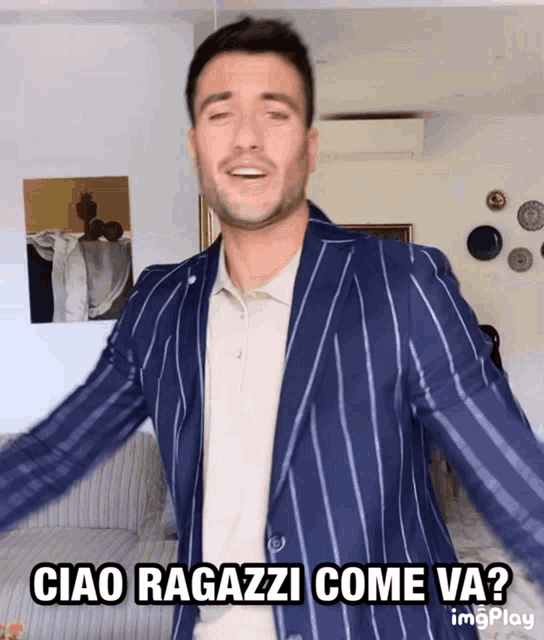 a man in a blue striped jacket says ciao ragazzi come va ?