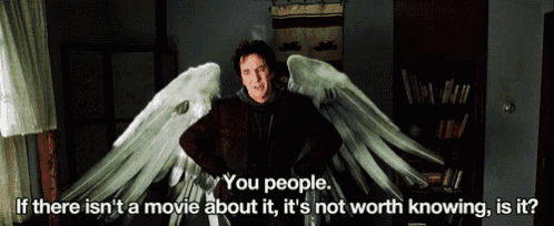 a man with angel wings says " you people "