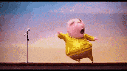 a cartoon pig is singing into a microphone while wearing a yellow jacket .
