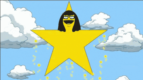 a yellow star with a cartoon character on top