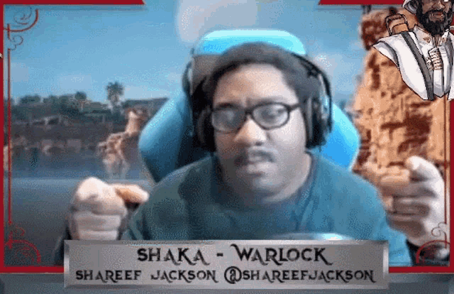 a man wearing headphones holds a sign that says ' shaka warlock ' on it