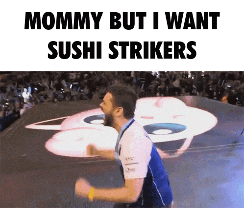 a man stands on a stage with the words mommy but i want sushi strikers on the bottom