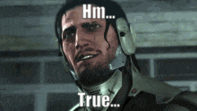 a man wearing a helmet and headphones is smiling and says `` hm ... true ... '' .