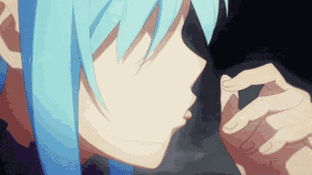 a person with blue hair is kissing another person