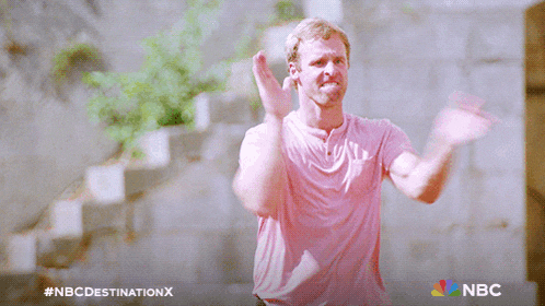 a man in a pink shirt is clapping in a nbc destination x advertisement