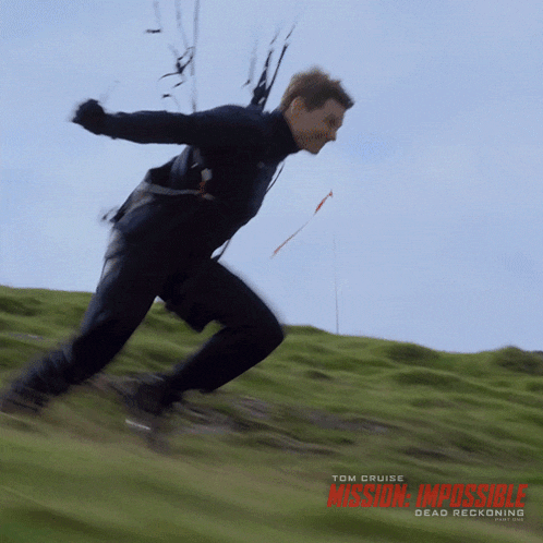 a poster for the movie mission impossible shows a man flying a kite