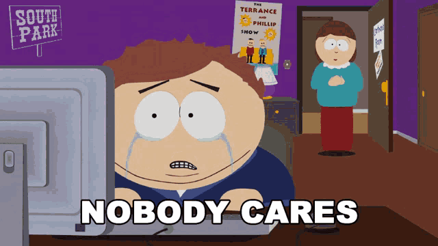 a south park cartoon character is crying in front of a computer monitor