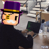 a man wearing a top hat is typing on a laptop computer