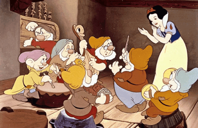 a cartoon of snow white and the seven dwarfs is shown