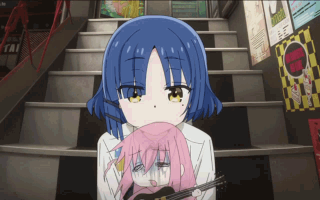 a girl with blue hair is holding a girl with pink hair and a guitar