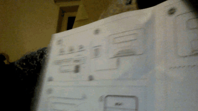 a piece of paper with a drawing of a cell phone