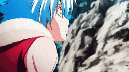 a boy with blue hair and a red vest is standing in front of a rocky cliff .