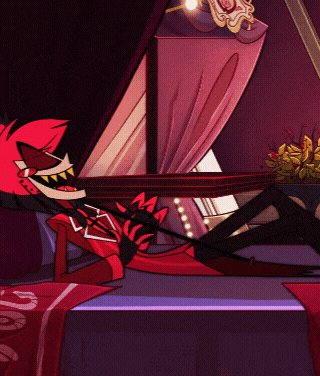 a cartoon character is laying on a bed with his legs crossed and his mouth open