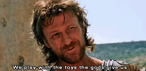 We Play With The Toys Gods Give Us Troy GIF - We Play With The Toys Gods Give Us Troy Sean Bean GIFs