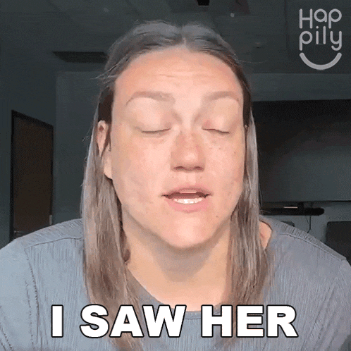 a woman with her eyes closed is saying i saw her