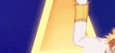 a man in a white suit and gold gloves is standing in front of a yellow light .