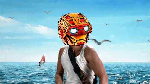 a man with a helmet on his head is standing in the ocean