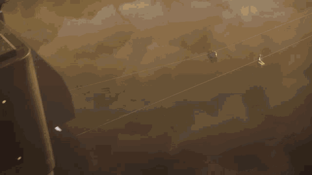 a couple of birds are sitting on a power line