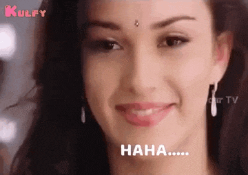 a close up of a woman 's face with the words `` haha '' written in the corner .