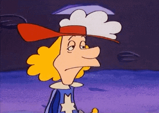 a cartoon character wearing a blue cape and red hat