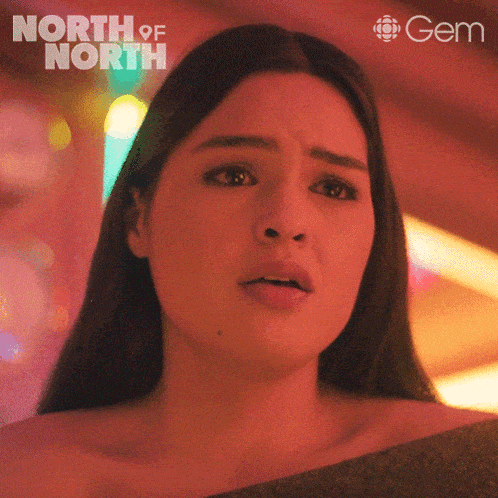 a close up of a woman 's face with the words north of north on the top