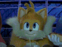 a close up of a sonic the hedgehog mascot eating a sandwich .