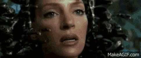 a woman with a surprised look on her face .