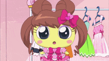 a cartoon character wearing a pink dress and a pink bow