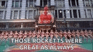 a group of people are standing in front of a building with the words `` those rocketts were great as always ''