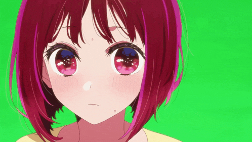 a close up of a girl 's face with a green background