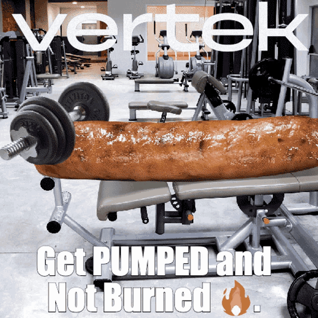 a large sausage is sitting on a bench in a gym with the words vertek get pumped and not burned on the bottom