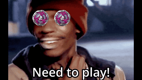 a man wearing a red beanie and sunglasses says " need to play "