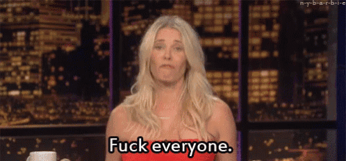 a woman says fuck everyone in front of a city skyline