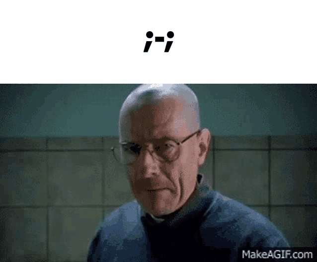a man wearing glasses and a blue sweater is making a funny face .
