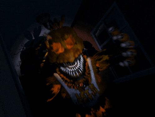 a picture of a monster with a glowing mouth and teeth in the dark