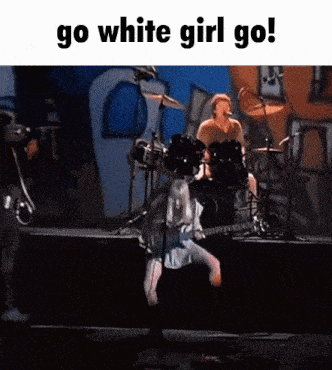 a man playing drums and a woman playing a guitar on stage with the words go white girl go