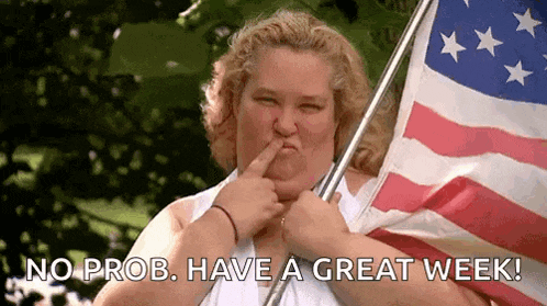 a woman is holding an american flag and making a face while saying no prob have a great week .