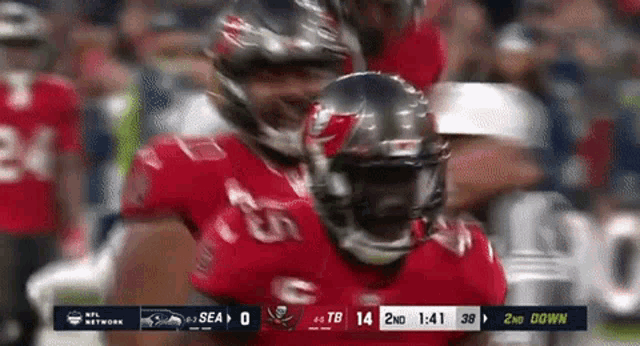 a football game is being played between the buccaneers and seahawks