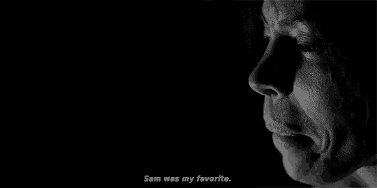 a black and white photo of a woman 's face with the words `` sam was my favorite '' written on it .
