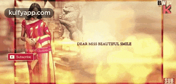 a woman in a red and white saree is standing in front of a statue with the words dear miss beautiful smile below her