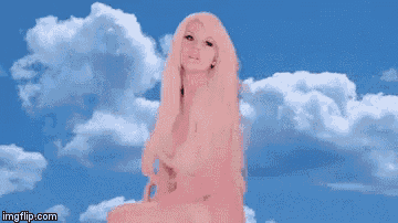 a naked woman with long blonde hair is sitting in front of a blue sky with clouds .