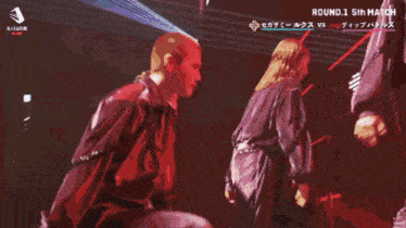 a group of people dancing in front of a coca cola ad