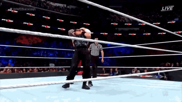 a wrestling match is being broadcast live on wwe