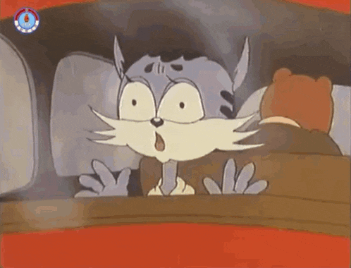 a cartoon character is looking at a picture of a tiger .