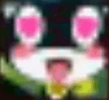 a blurred image of a cartoon character with pink eyes and a tongue sticking out .