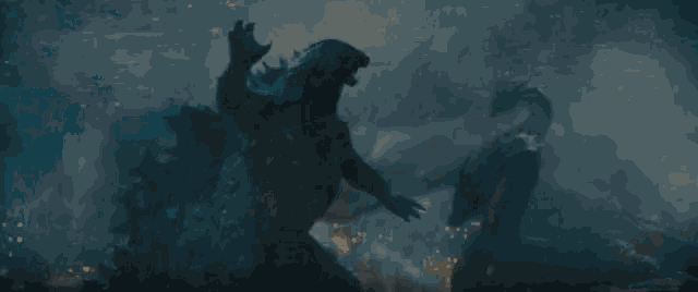 two monsters are fighting each other in the rain with a city in the background