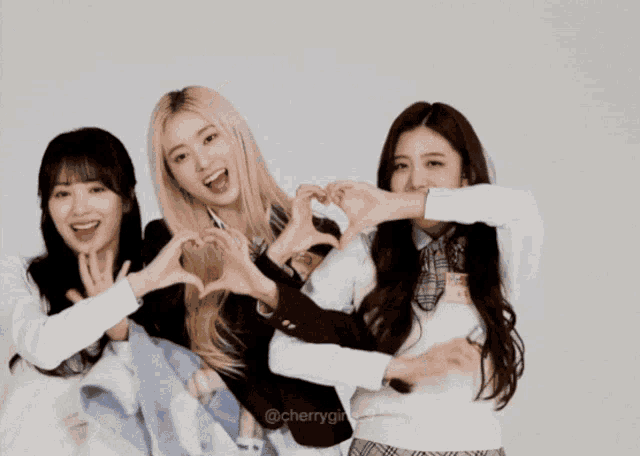 three girls are making a heart shape with their hands and the hashtag cherrygirls 9